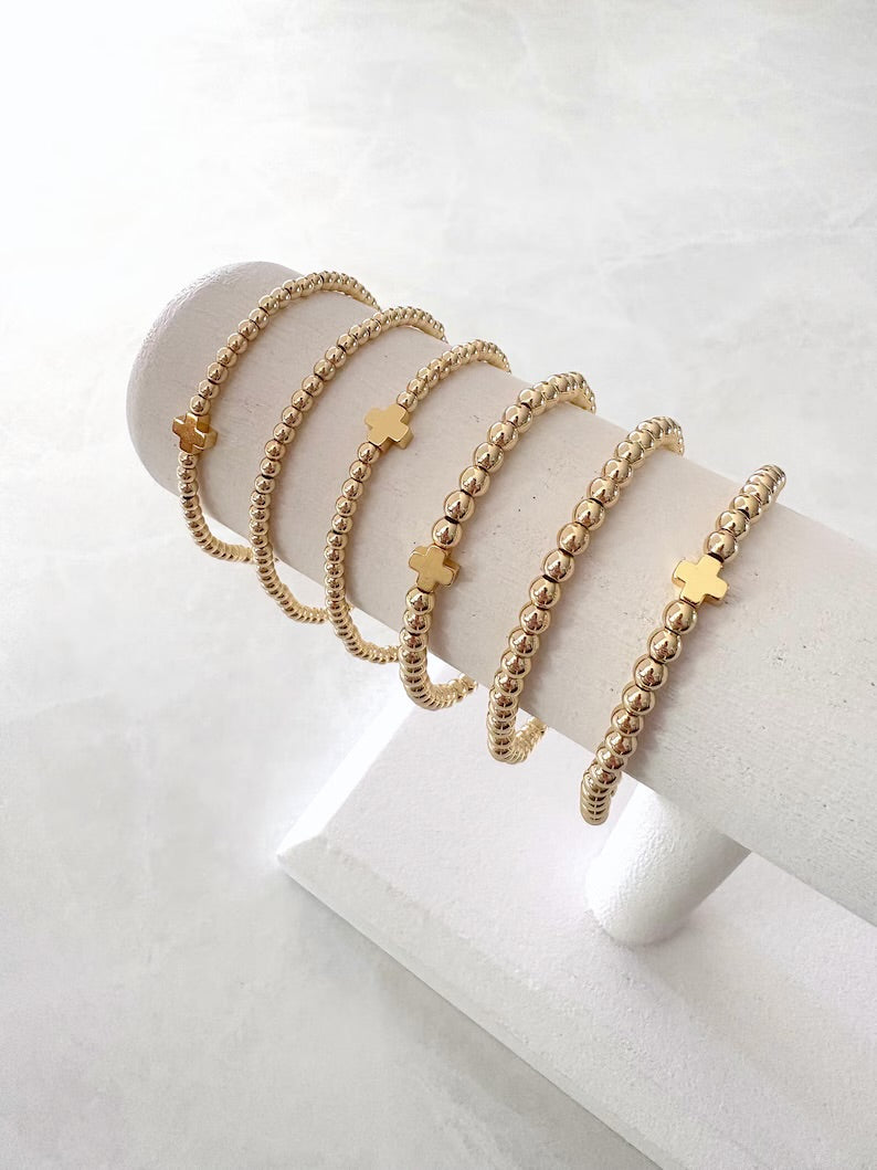 The Signature Gold Cross Collection