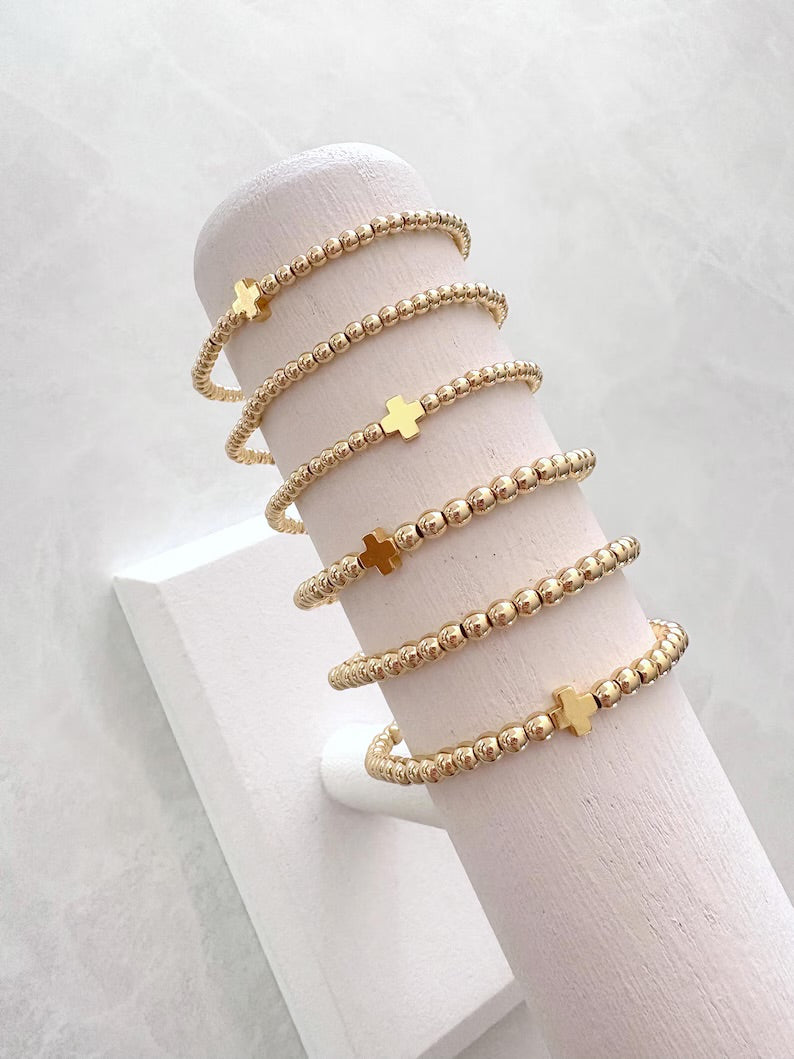 The Signature Gold Cross Collection