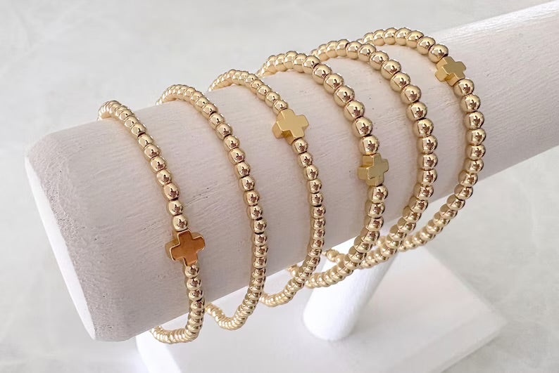 The Signature Gold Cross Collection