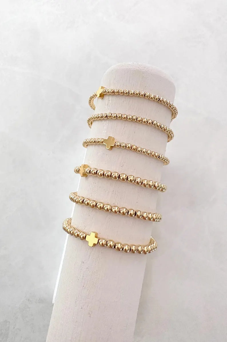 The Signature Gold Cross Collection