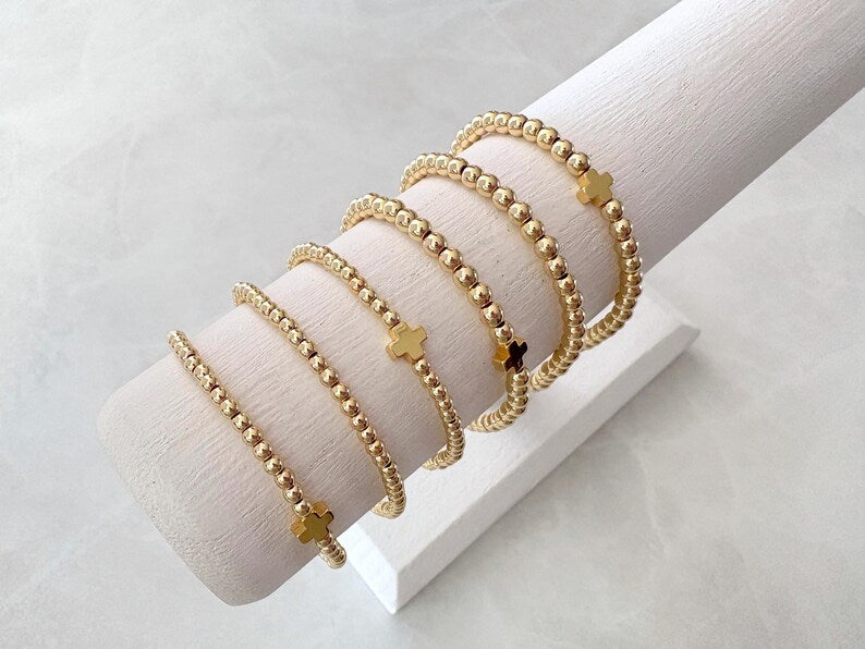 The Signature Gold Cross Collection