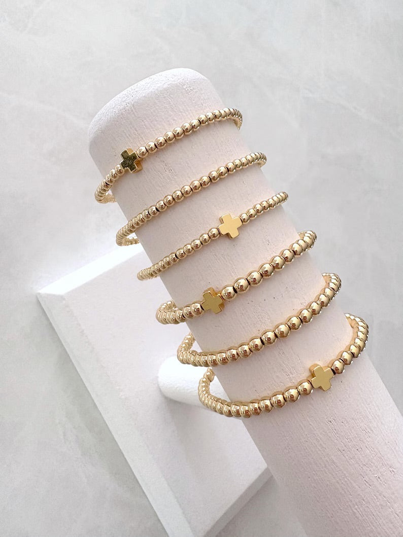 The Signature Gold Cross Collection