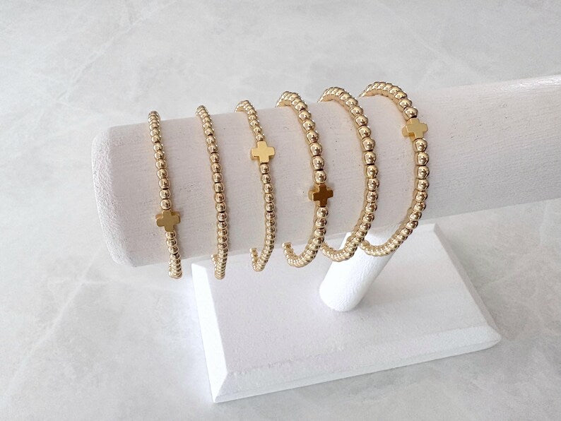 The Signature Gold Cross Collection